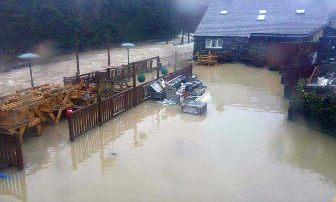 The waterlogged beer garden of the Glenridding Hotel in Cumbria.