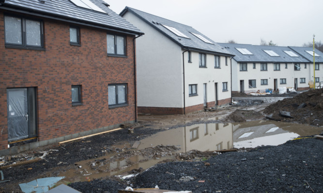 The Mill O' Mains houses have been affected by flooding.