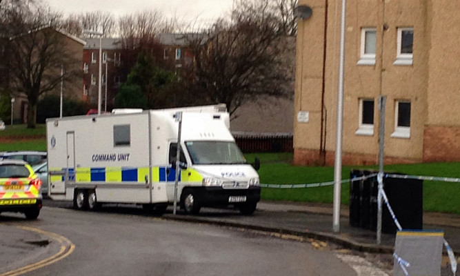There is a heavy police presence at the flats in Thurso Crescent.