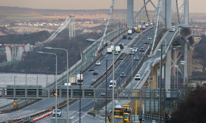 Traffic crosses the Forth Road Bridge as it re opens to all traffic except HGV's.