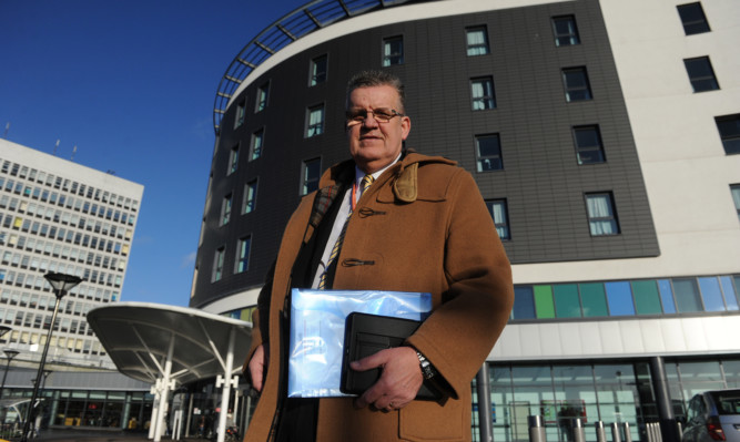 Councillor Andrew Rodger outside Victoria Hospital in Kirkcaldy.