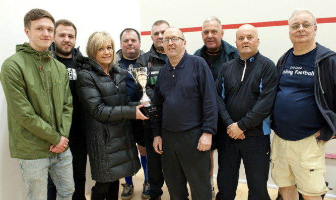 The Knox family with the tournaments winning team.