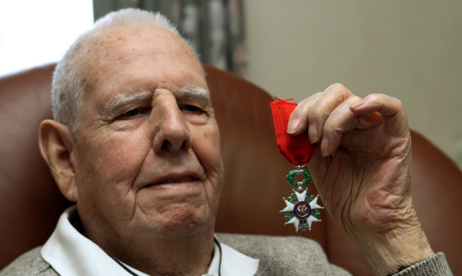 Alexander Shepherd with his medal.