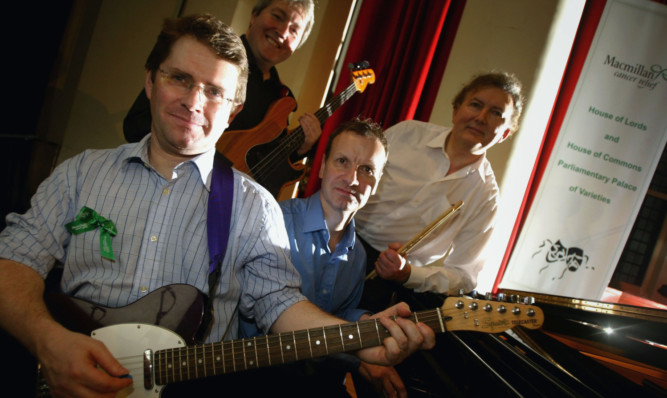 Kevin Brennan, Labour MP for Cardiff West, Ian Cawsey, Labour party member, Pete Wishart, SNP MP for Perth and North Perthshire, and Greg Knight, Conservative MP for East Yorkshire, put aside their political differences to form rock band MP4.