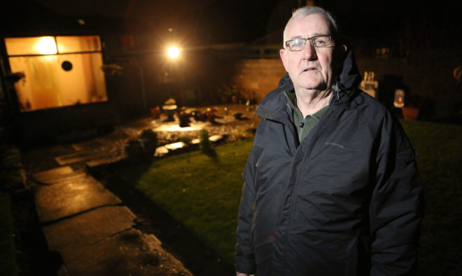 Alex Macfarlane says his garden regularly floods.