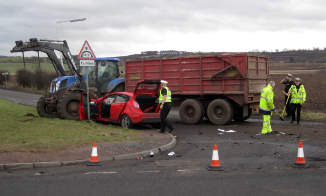 The tractor collided with the car on the A92 near Freuchie. Catherine Armitt died the following day.