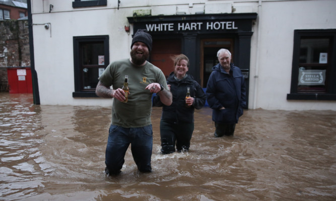 Locals found a way to cope during serious flooding in Dumfries on Wednesday.