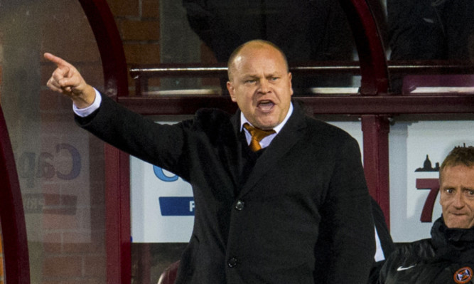 Mixu Paatelainen makes a point during the Hearts match.