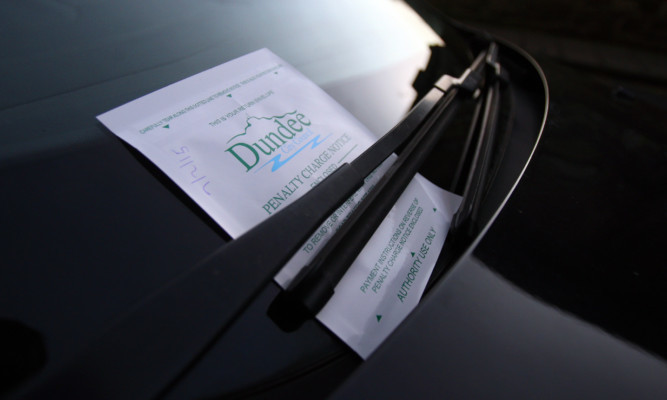 Kris Miller, Courier, 07/02/15. Picture today shows general view of a parking ticket on a car in Dundee City Centre for files.