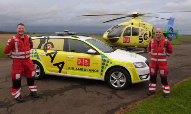 Paramedics Craig McDonald, left, and John Salmond with the services latest rapid-response vehicle.