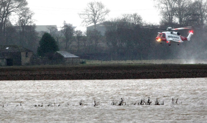 The helicopter rescue near Boglea Farm at Alyth.