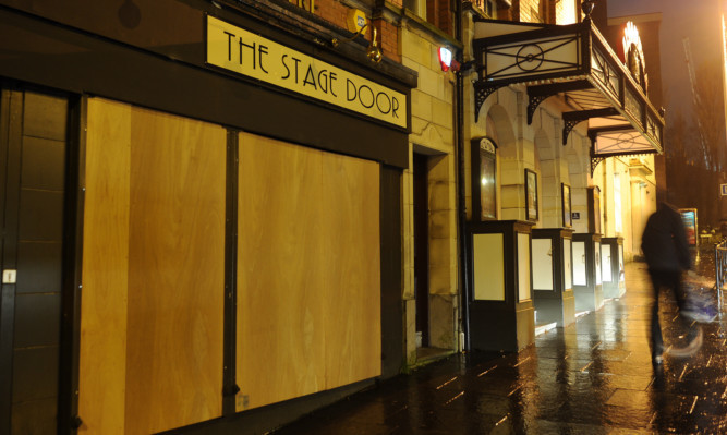 Alhambra Theatre says its boarded-up windows are merely a security measure during a brief January break for staff.