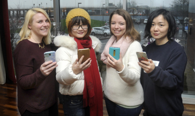 Emily with Kay (Hong Kong), Sophie (France) and Tao (Shanghai).