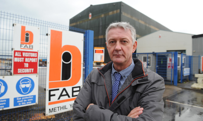 Councillor Tom Adams, chairman of the Levenmouth area committee, outside the BiFab yard in Methil.