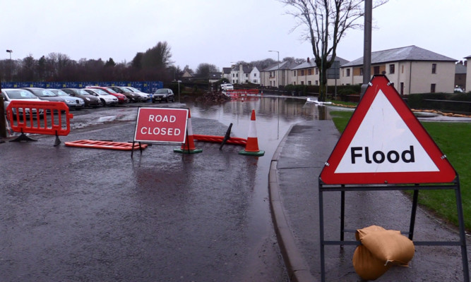 Flood water is still causing problems on the roads in Angus.
