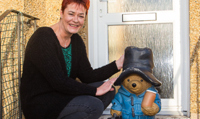 Alison Cowe has been reunited with the Paddington Bear that was stolen from her garden.