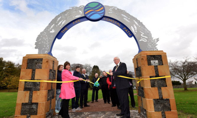 Provost Jim Leishman and Fife Coast & Countryside Trust CEO Amanda MacFarlane open the Newburgh Arch.