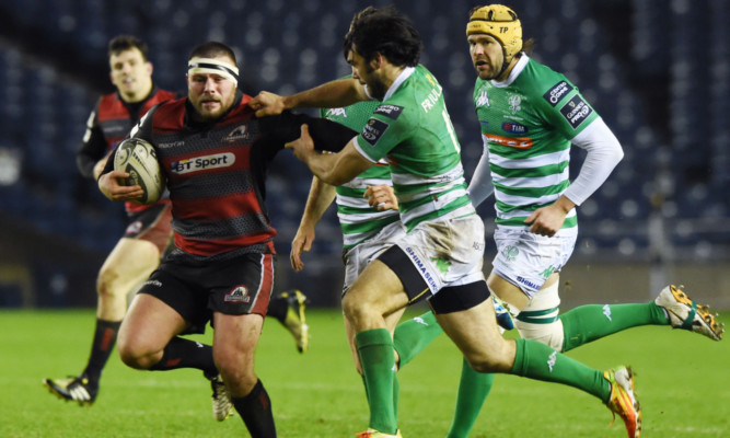 Rory Sutherland charges through the Treviso defence at Murrayfield.