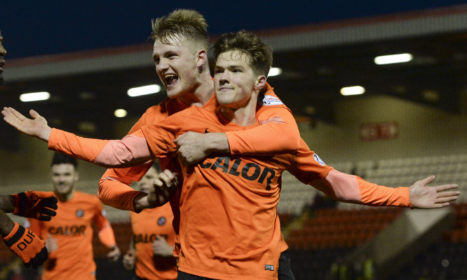 Coll Donaldson (left) congratulates goalscorer Blair Spittal.