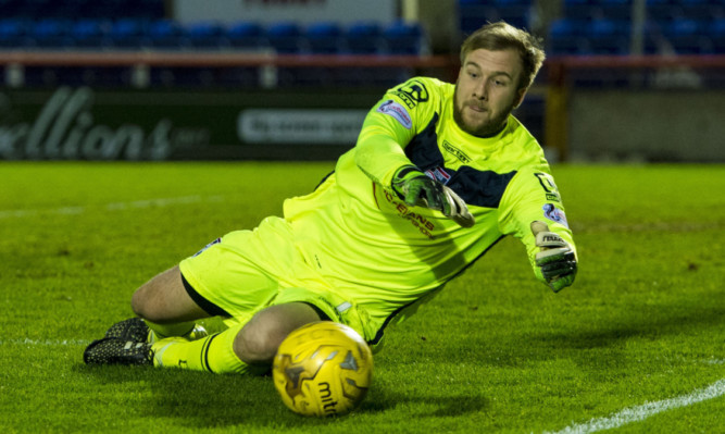 County keeper Scott Fox: praised by his manager for keeping his side in the tie with Dunfermline.