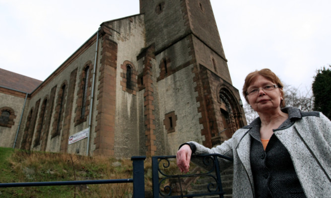 Kathleen Mands, chairwoman of Craigiebank Association, outside the church the group wants to knock down so that a new building can be constructed on the site.