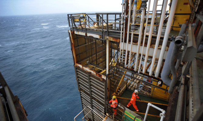 Workers on BP's ETAP oil platform in the North Sea.