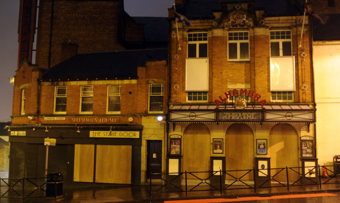 Boarded-up windows at the Alhambra Theatre had increased concerns for its futures.