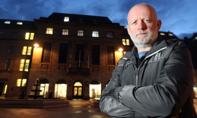 Scottish TUSC spokesman Philip Stott outside Dundee City Chambers.