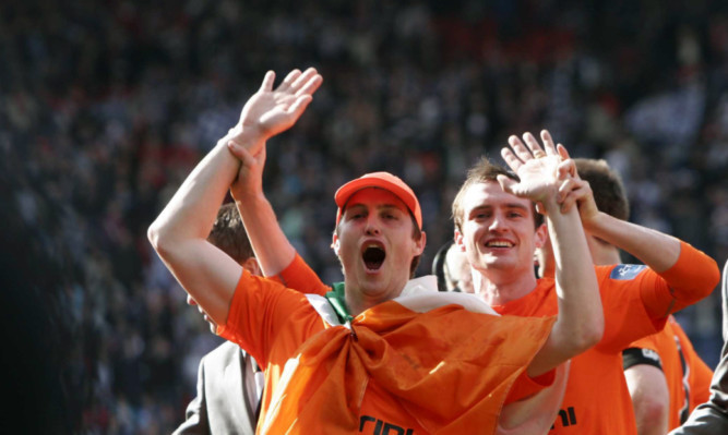 Jon Daly celebrates the cup final win.
