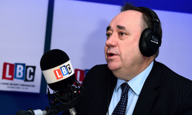Alex Salmond takes part in his first live weekly phone-in on the national news talk radio station LBC, hosted by presenter Iain Dale.