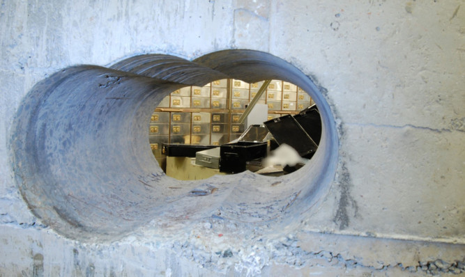 The tunnel leading into the vault at the Hatton Garden Safe Deposit company in London.