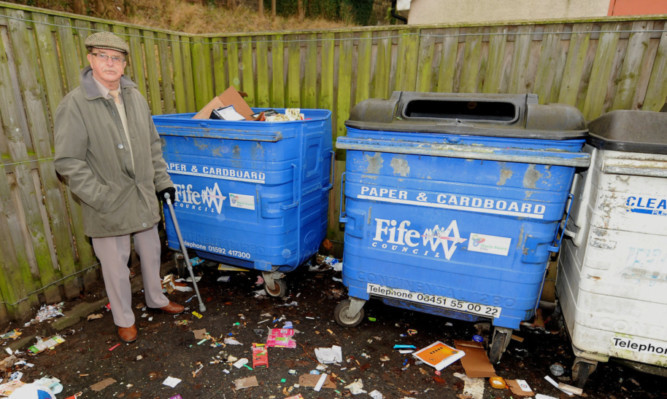 William Strawn, from Burntisland, at the recycling bins which were overflowing.