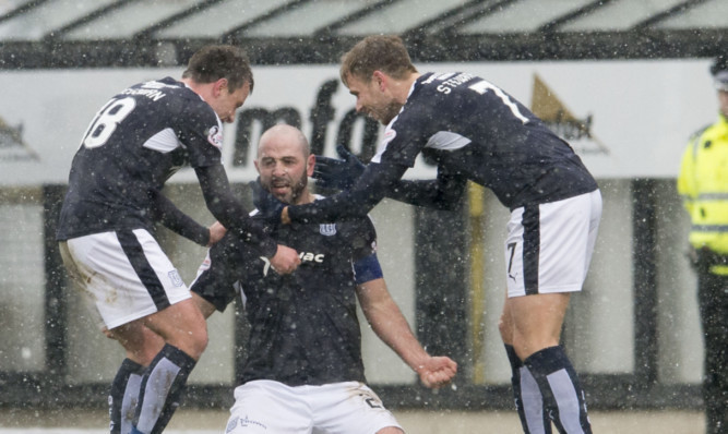 Gary Harkins celebrates his first goal and Dundee's second.