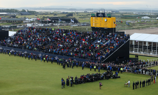 Large crowds listen to Zach Johnson's winner's speech at St Andrews last summer.