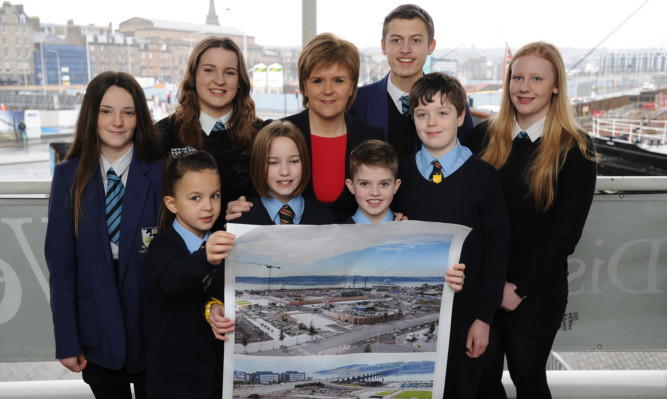 First Minister Nicola Sturgeo with pupils from Grove Academy and St Mary's Primary School.