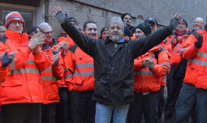 Sacked postal workers David Mitchell outisde the Cupar Post Office as former colleagues strike in support.