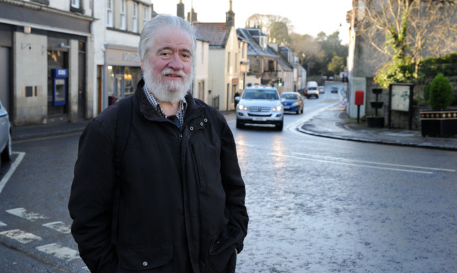 Arthur Lloyd of Aberdour Community Council in the centre of the village which will see a new 20mph zone and speed humps installed.