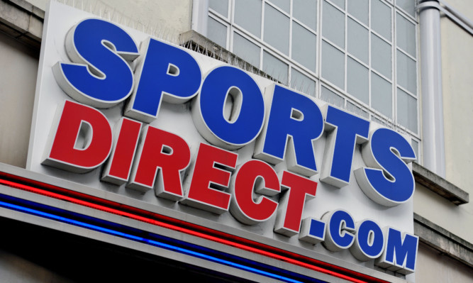 A sign above the Sports Direct store in Oxford Street, central London. PRESS ASSOCIATION Photo. Picture date: Wednesday January 6, 2016. Photo credit should read: Nick Ansell/PA Wire