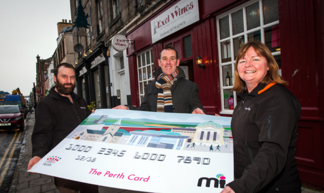 From left: Exel Wines general manager Russell Wallace, Miconex director Richard Gray and shop manager Keron Magee help to promote the Perth Gift Card.