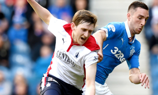 Blair Alston battles Rangers' Lee Wallace.