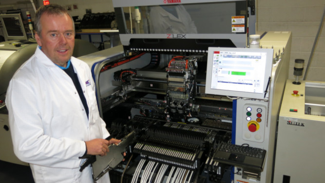 Finance director Jim Spence at one of the machines.