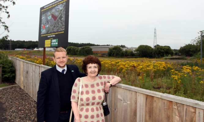 Councillor Alan Ross and Stella Carrington pictured at the new Aldi superstore site next to Asda Myrekirk.