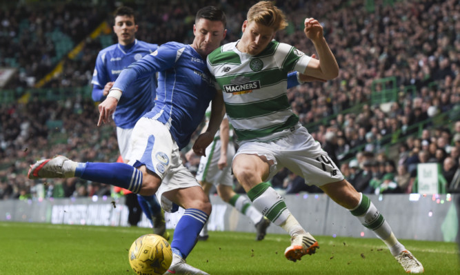 Michael O'Halloran (left) battles with Celtic's Stuart Armstrong.