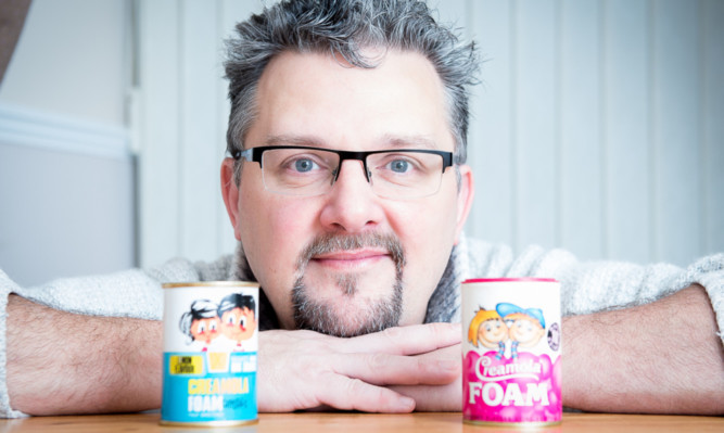 Roddy Nicoll with the Creamola tins.