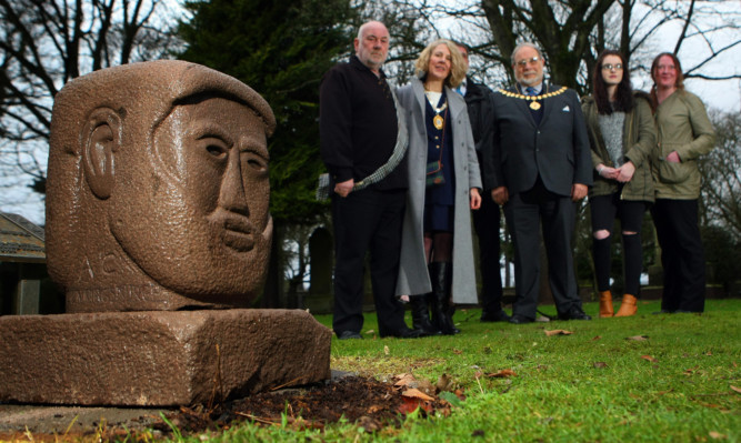 The sculpture with Dave Ramsay, deputy provost of Aberdeenshire Allison Grant, sculptor Brian Wylie, deputy provost of Angus Alex King and Christie descendants Megan and Laura Christie.