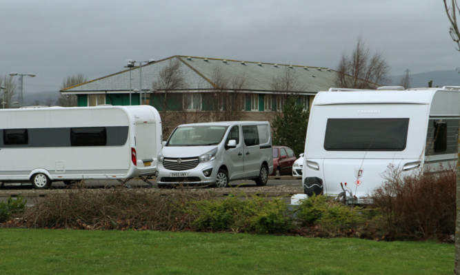 Traveller vans parked outside Angus Council HQ in Forfar on Thursdsay.