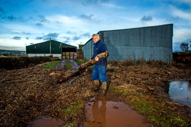 Steve MacDougall, Courier, Haugh of Aberuthven Farm, Aberuthven. Picture of farmer James Haggart to accompany story about his calls for SEPA to take action after his farm was badly damaged after recent flooding. Pictured, Mr Haggart clearing debris from the recent flood.
