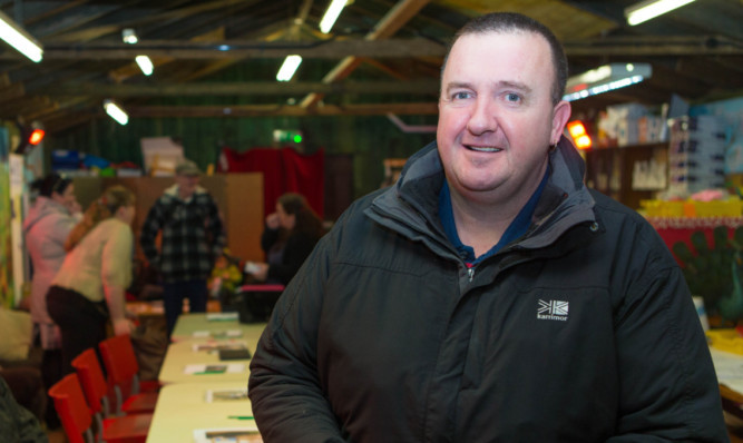 Kenny Watson at the drop-in event to show concerned locals the plans for the new security team.