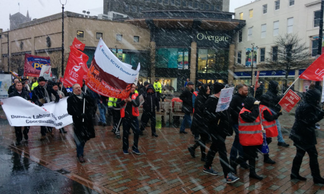 Protesters braving the weather.