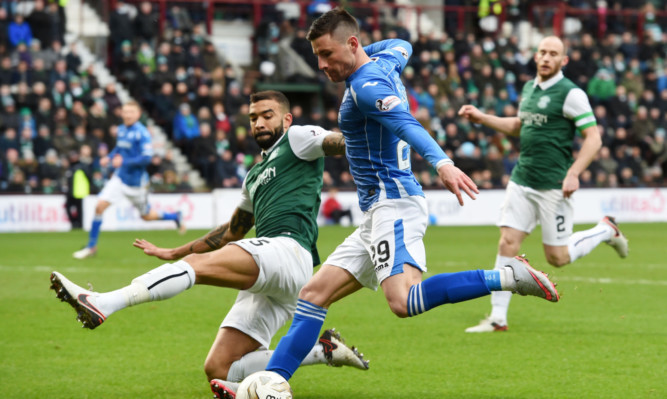 Michael O'Halloran is closed down by Liam Fontaine.